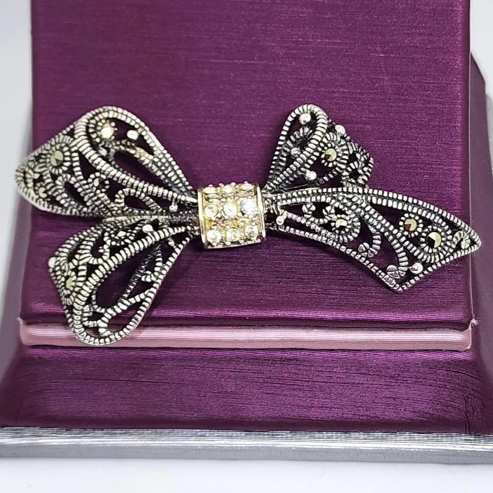 Vintage Sterling Silver Rhinestone and Marcasite Accent Bow Pin Brooch
